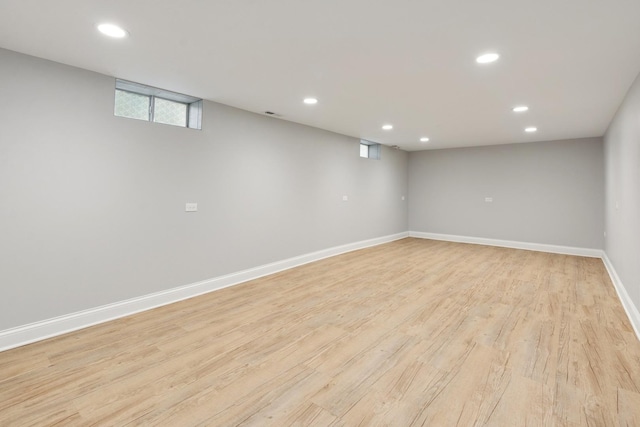 5941 N Mccook Ave, Chicago, IL 60646 - below grade area featuring light wood-style flooring, baseboards, and recessed lighting
