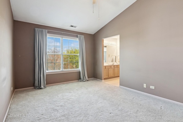 271 Valley Forge Ave, South Elgin, IL 60177 - unfurnished room with lofted ceiling, visible vents, baseboards, and light carpet