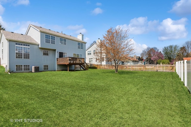 271 Valley Forge Ave, South Elgin, IL 60177 - rear view of property with a deck, a fenced backyard, central AC unit, and a lawn