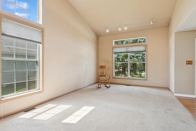 271 Valley Forge Ave, South Elgin, IL 60177 - carpeted spare room with track lighting, visible vents, and baseboards