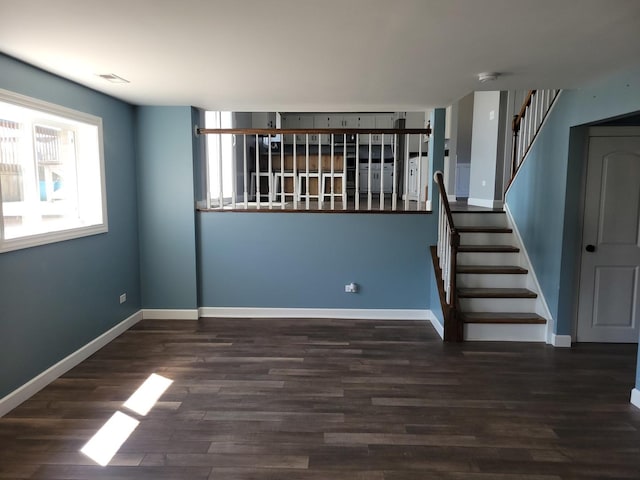 310 E Butler Ave, Grant Park, IL 60940 - interior space featuring wood finished floors, baseboards, and visible vents