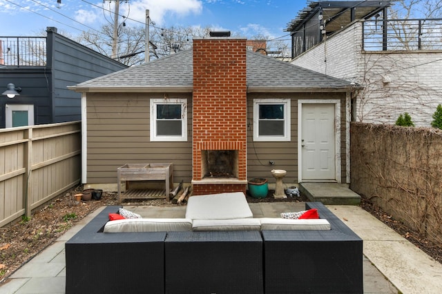view of patio with outdoor lounge area and fence