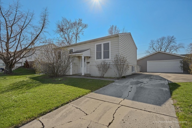308 Eaton Ave, Romeoville, IL 60446 - raised ranch with an outbuilding, a detached garage, and a front lawn