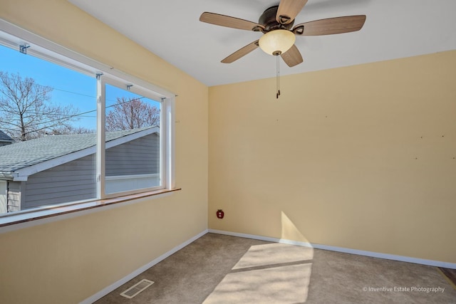 308 Eaton Ave, Romeoville, IL 60446 - unfurnished room featuring baseboards, carpet, visible vents, and a wealth of natural light