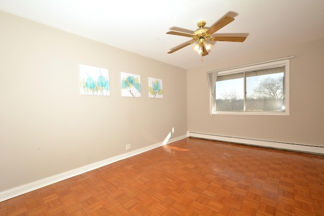 4731 Saint Joseph Creek Rd Unit 5G, Lisle, IL 60532 - spare room with baseboards, a ceiling fan, and baseboard heating