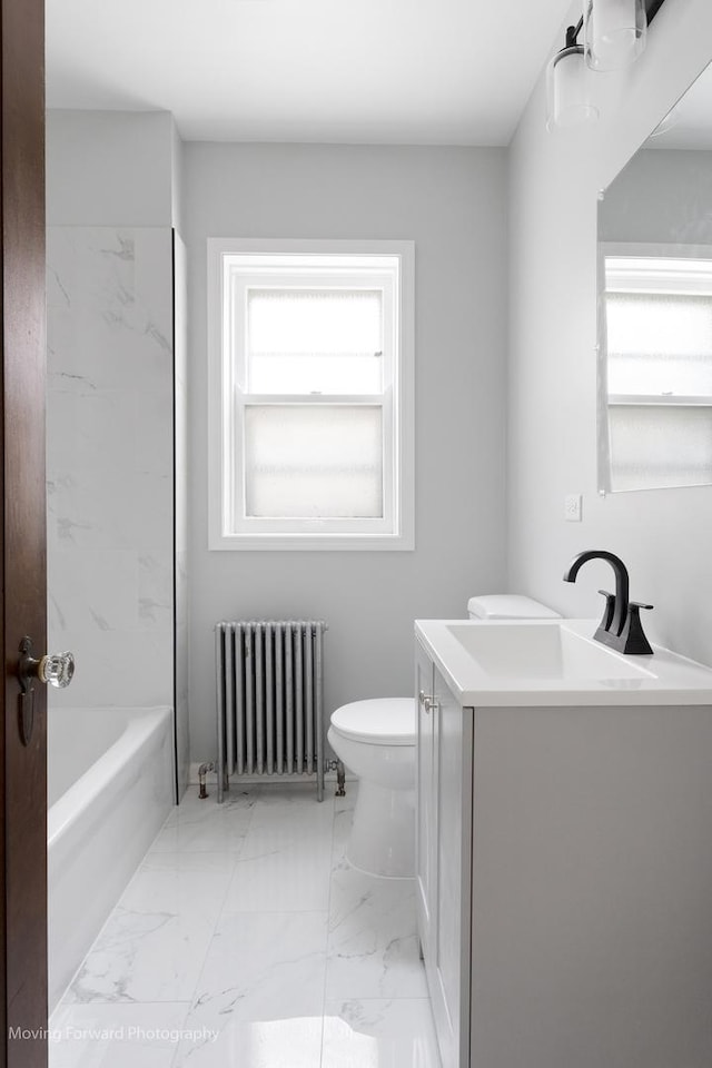 1916 Kenilworth Ave, Berwyn, IL 60402 - bathroom featuring radiator heating unit, vanity, marble finish floor, and toilet