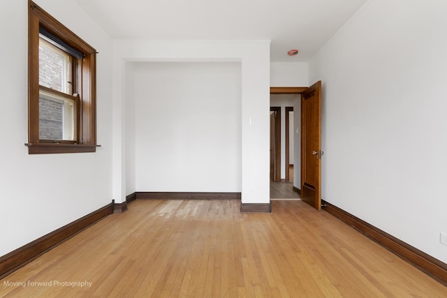 1916 Kenilworth Ave, Berwyn, IL 60402 - empty room featuring light wood-style flooring and baseboards