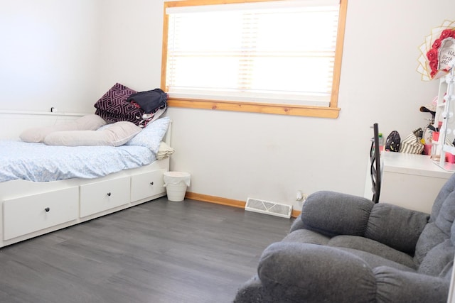 14435 Karlov Ave, Midlothian, IL 60445 - bedroom with baseboards, wood finished floors, and visible vents