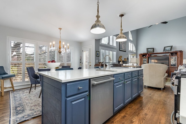 2219 Barrett Dr, Algonquin, IL 60102 - kitchen with appliances with stainless steel finishes, blue cabinetry, open floor plan, and dark wood finished floors