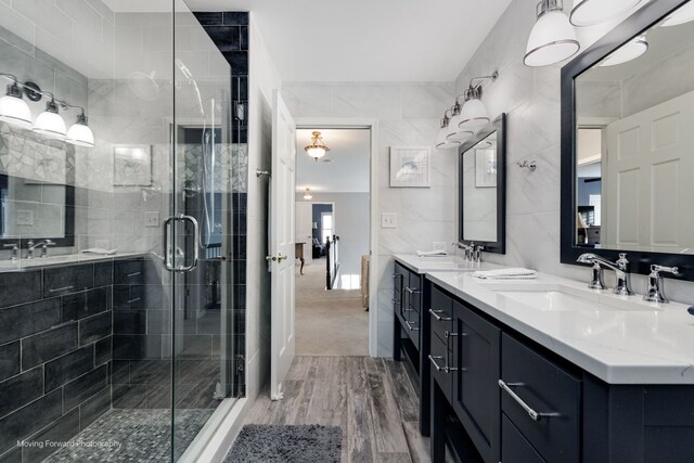 2219 Barrett Dr, Algonquin, IL 60102 - full bath featuring double vanity, wood finished floors, and a shower stall