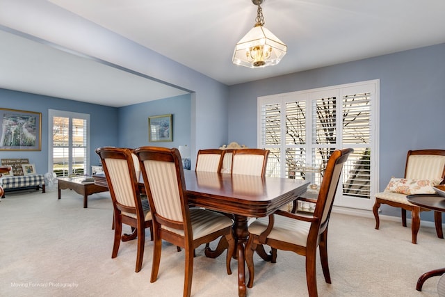 2219 Barrett Dr, Algonquin, IL 60102 - dining room featuring light colored carpet and a chandelier