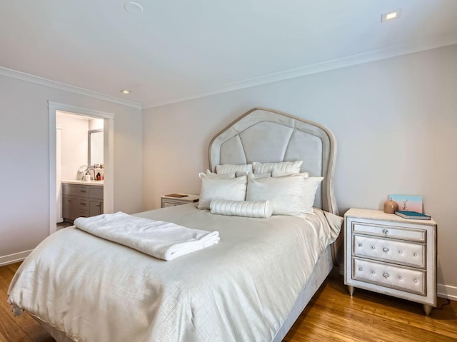 9748 Mill Dr E Unit 2E, Palos Park, IL 60464 - bedroom with crown molding, wood finished floors, baseboards, and ensuite bathroom