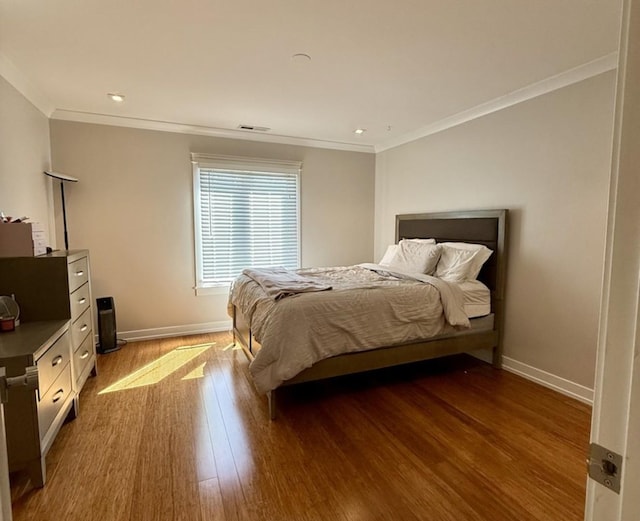 9748 Mill Dr E Unit 2E, Palos Park, IL 60464 - bedroom with dark wood-style floors, ornamental molding, baseboards, and recessed lighting