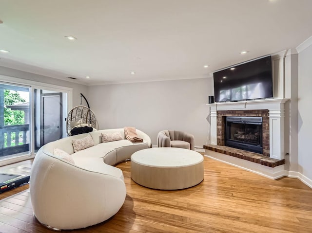 9748 Mill Dr E Unit 2E, Palos Park, IL 60464 - living room featuring a brick fireplace, wood finished floors, and recessed lighting