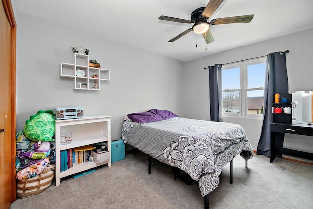 bedroom featuring a ceiling fan and carpet flooring