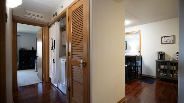 hall with baseboards and wood-type flooring