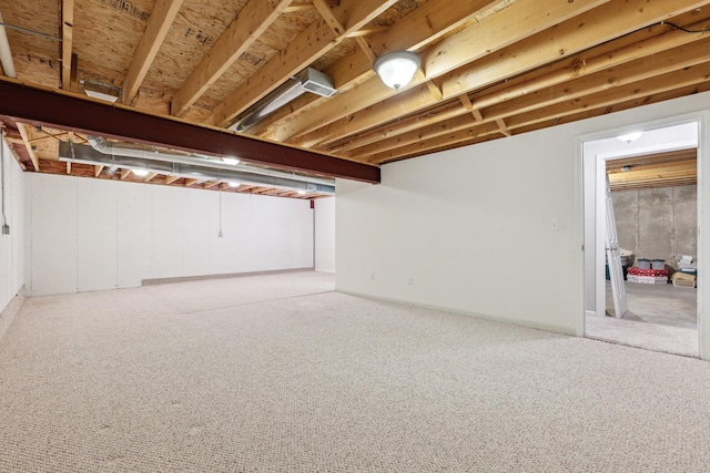 unfinished basement featuring carpet