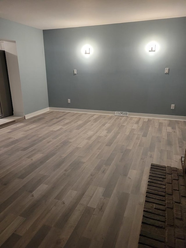 579 Price Ave, Calumet City, IL 60409 - spare room with wood finished floors and baseboards
