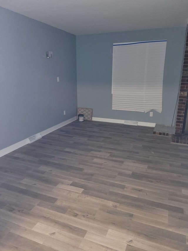 579 Price Ave, Calumet City, IL 60409 - unfurnished room with wood finished floors and baseboards