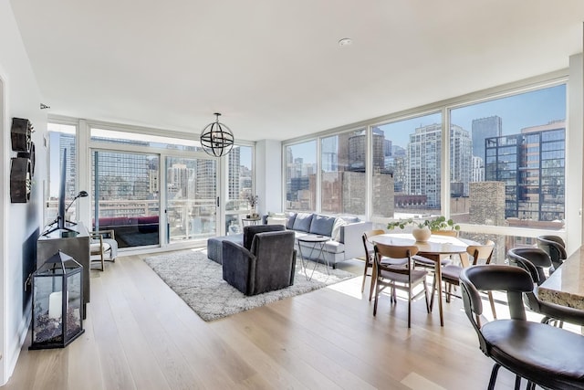 interior space featuring an inviting chandelier and a city view