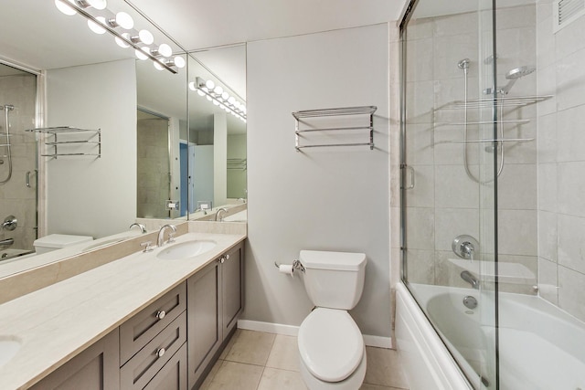 600 N Kingsbury St Unit 1612, Chicago, IL 60654 - bathroom with tile patterned flooring, shower / bath combination with glass door, toilet, vanity, and baseboards