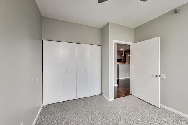 600 N Kingsbury St Unit 1612, Chicago, IL 60654 - unfurnished bedroom featuring a closet, carpet flooring, and baseboards