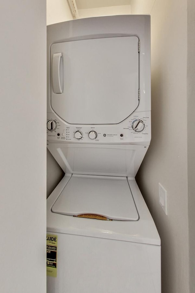 600 N Kingsbury St Unit 1612, Chicago, IL 60654 - laundry area featuring stacked washer and clothes dryer and laundry area