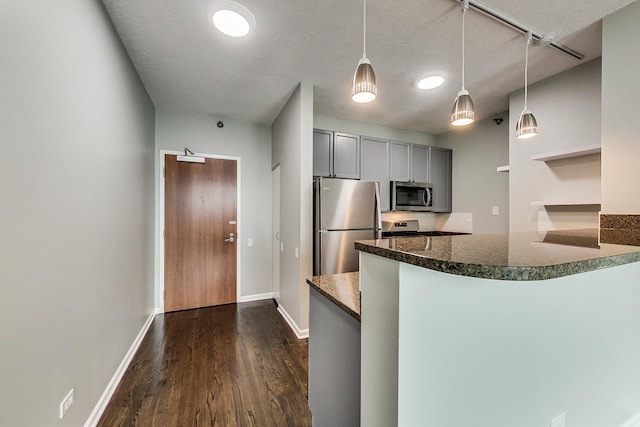 600 N Kingsbury St Unit 1612, Chicago, IL 60654 - kitchen with open shelves, appliances with stainless steel finishes, dark wood-style floors, a peninsula, and gray cabinets
