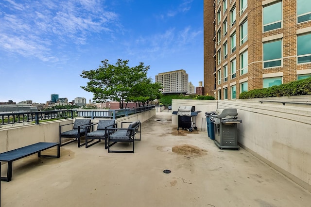 600 N Kingsbury St Unit 1612, Chicago, IL 60654 - view of patio featuring a grill and a city view