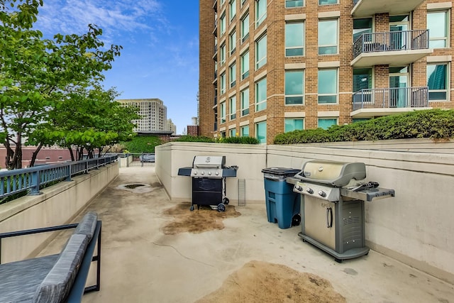 600 N Kingsbury St Unit 1612, Chicago, IL 60654 - view of patio with a grill and fence