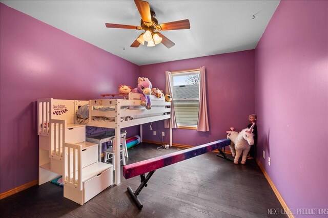 317 Plymouth Ct, Sycamore, IL 60178 - bedroom featuring wood finished floors, baseboards, and ceiling fan