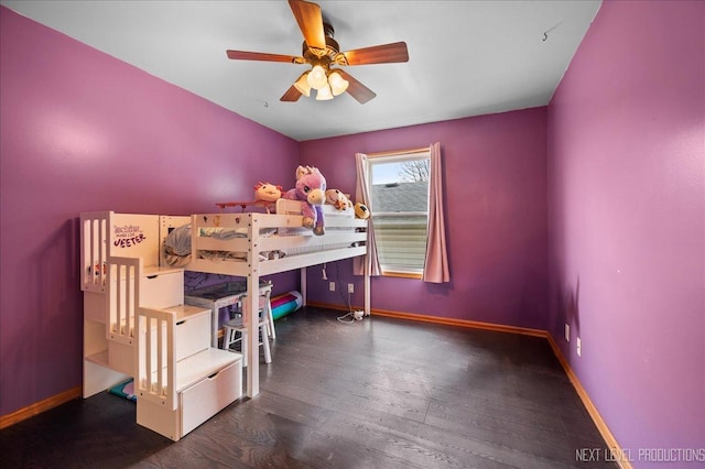 317 Plymouth Ct, Sycamore, IL 60178 - bedroom featuring wood finished floors, baseboards, and ceiling fan