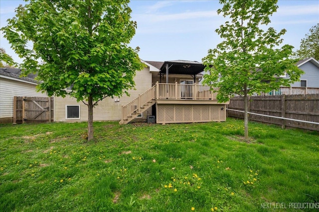 317 Plymouth Ct, Sycamore, IL 60178 - view of yard featuring a gazebo, a wooden deck, stairs, and a gate