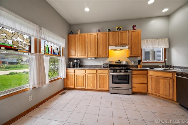 317 Plymouth Ct, Sycamore, IL 60178 - kitchen featuring stainless steel gas stove, a sink, under cabinet range hood, dishwasher, and dark countertops