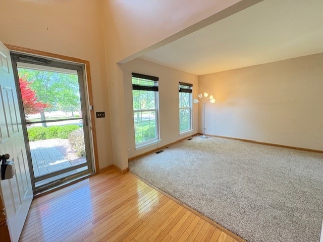 794 Meadowridge Dr, Aurora, IL 60504 - entryway with light wood finished floors and baseboards