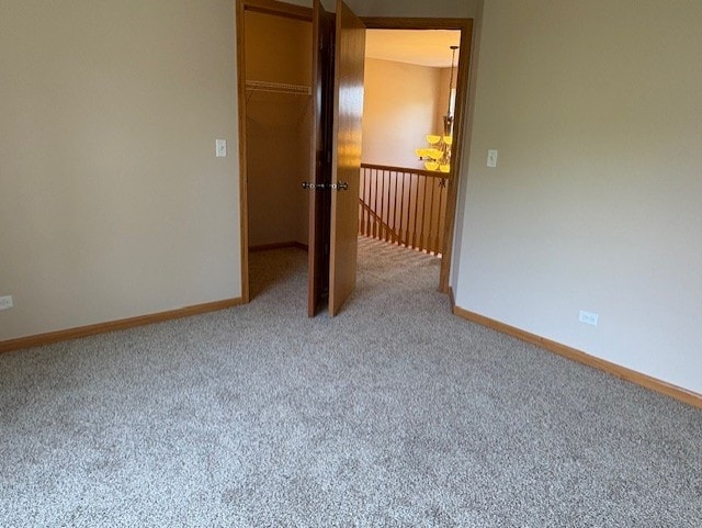 794 Meadowridge Dr, Aurora, IL 60504 - carpeted spare room featuring baseboards