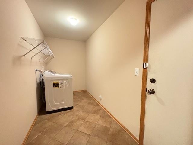 794 Meadowridge Dr, Aurora, IL 60504 - washroom featuring washer hookup and light tile patterned floors