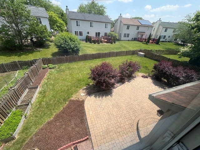 794 Meadowridge Dr, Aurora, IL 60504 - fenced backyard featuring a residential view and a patio
