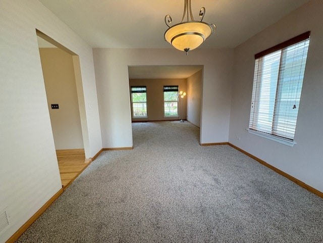 794 Meadowridge Dr, Aurora, IL 60504 - carpeted spare room featuring baseboards