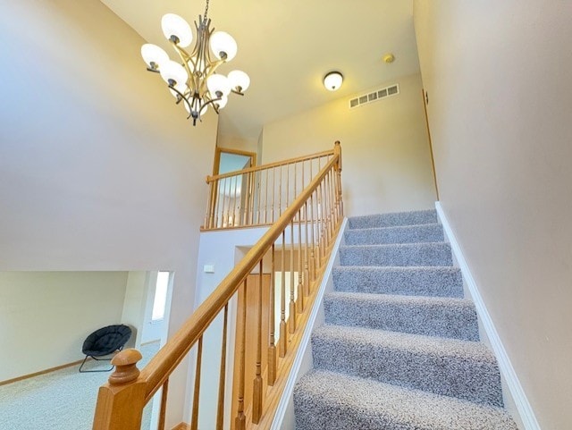 794 Meadowridge Dr, Aurora, IL 60504 - stairs with carpet floors and a chandelier