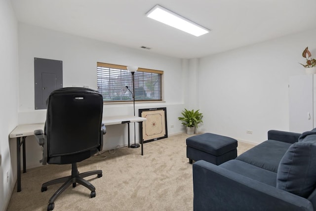 office area featuring carpet flooring, electric panel, and visible vents