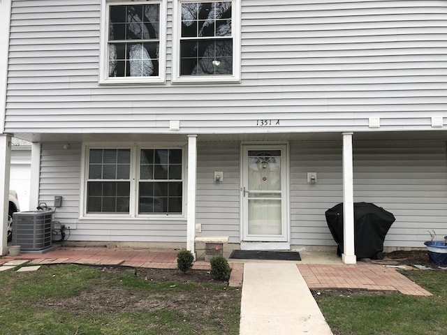 1351 N Glen Cir Unit A, Aurora, IL 60506 - view of exterior entry with cooling unit
