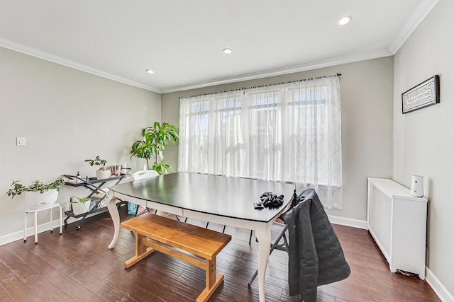dining area featuring a wealth of natural light, baseboards, and crown molding