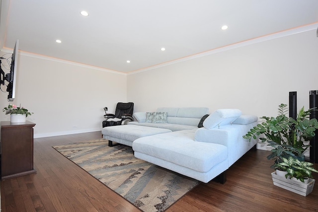 living area with recessed lighting, ornamental molding, baseboards, and wood finished floors