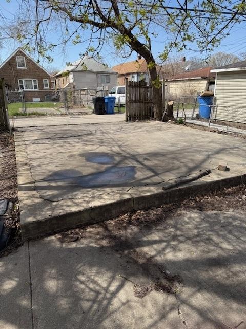 9144 S Dobson Ave, Chicago, IL 60619 - view of patio featuring fence