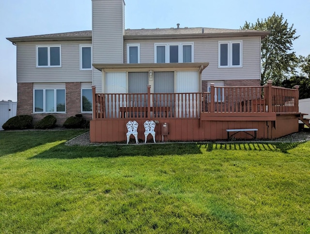 18507 Indie Ct, Hazel Crest, IL 60429 - back of house featuring a wooden deck, a yard, a chimney, and brick siding
