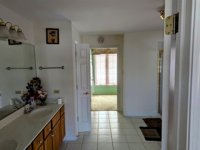 18507 Indie Ct, Hazel Crest, IL 60429 - bathroom with double vanity, tile patterned flooring, and baseboards