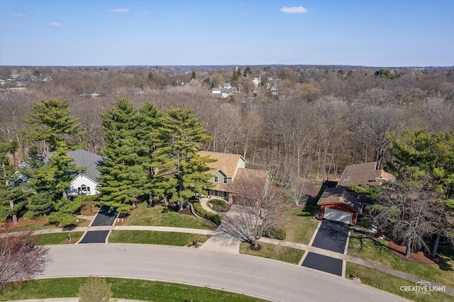 drone / aerial view with a view of trees