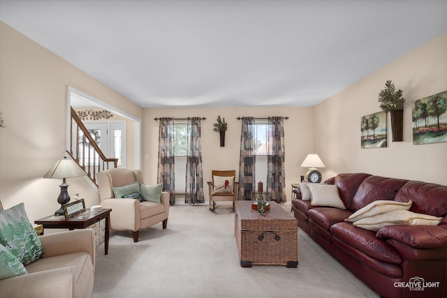 living room with light colored carpet