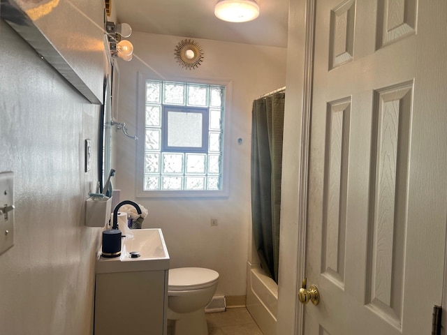 14701 E Riverside Dr, South Holland, IL 60473 - full bath with vanity, toilet, tile patterned floors, and shower / bath combo with shower curtain
